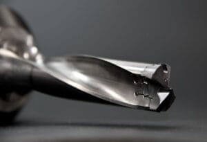 Sell Business A close up of a metal cutting tool used in a Metal Service Center Business. Exit Advisor Business Broker