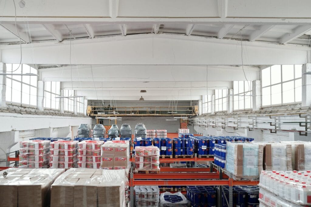 Sell Business A logistics business warehouse stocked with high-value water bottles available for sale. Exit Advisor Business Broker