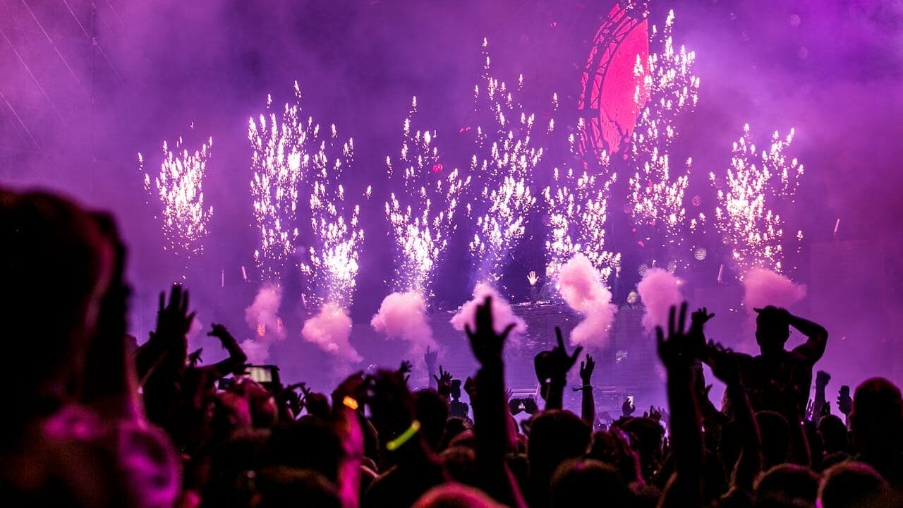 How to Sell a Nightclub Business. Sell Business A crowd at a concert with fireworks in the background at a nightclub business. Exit Advisor Business Broker