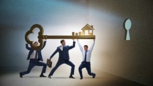 The Role of Real Estate Agents in Mexico for Foreign Investors - Sell Business Three businessmen carry a large golden key towards a keyhole with a house-shaped top on a wall, symbolizing goal achievement in Mexico Real Estate. Exit Advisor Business Broker