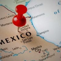 Buy Business Red pin on a map highlighting Mexico, showing nearby cities and geographic details related to closing business deals. Exit Advisor Business Broker